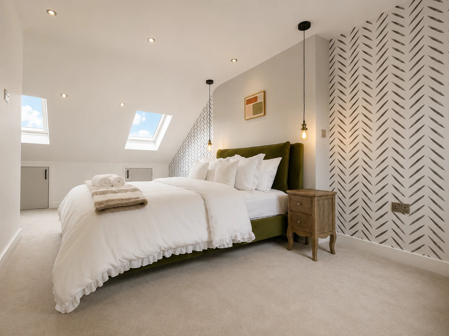 A loft bedroom in Rob’s Windsor property, designed by Nomi Atelier for serviced accommodation